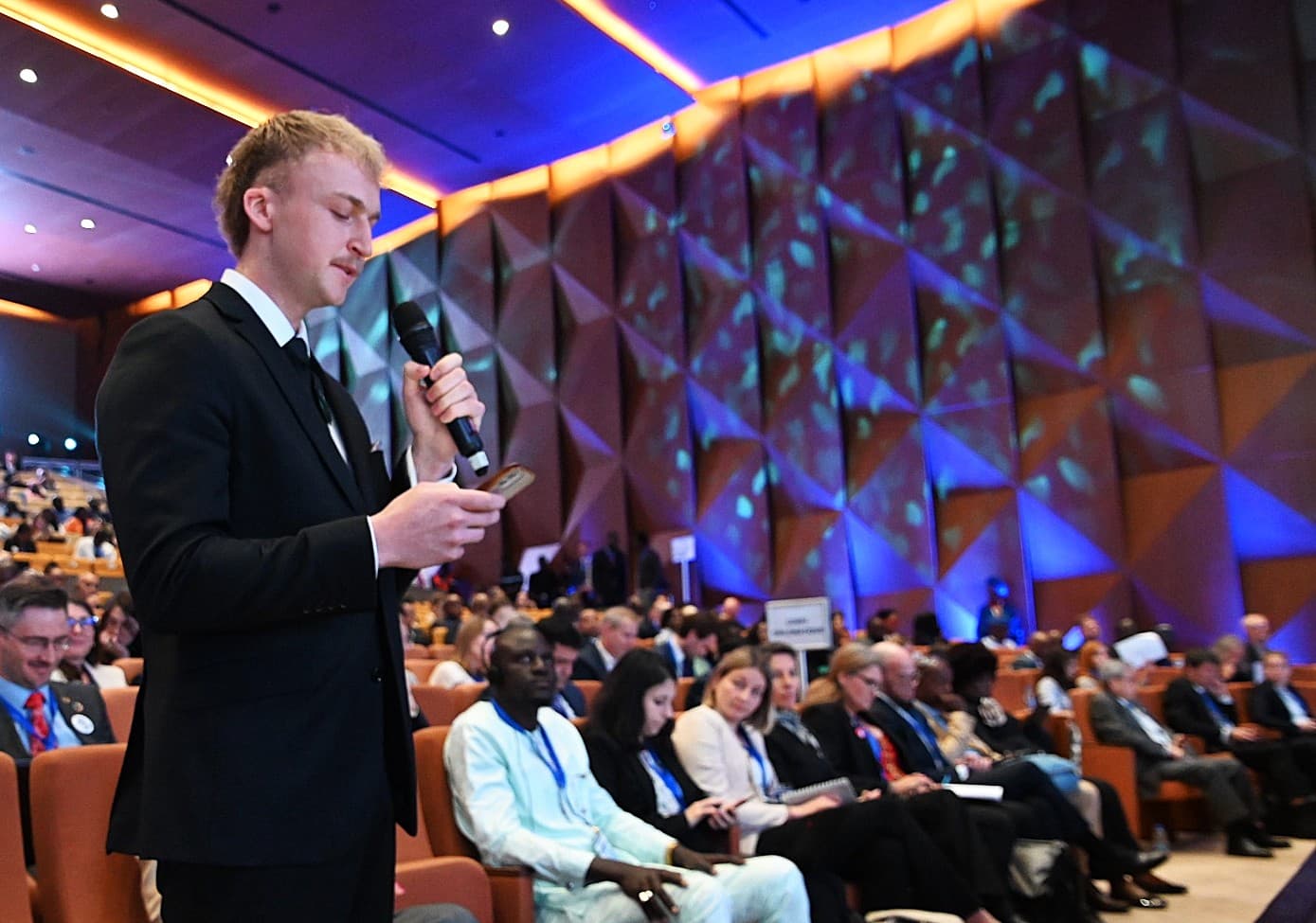 Connor speaking to conference